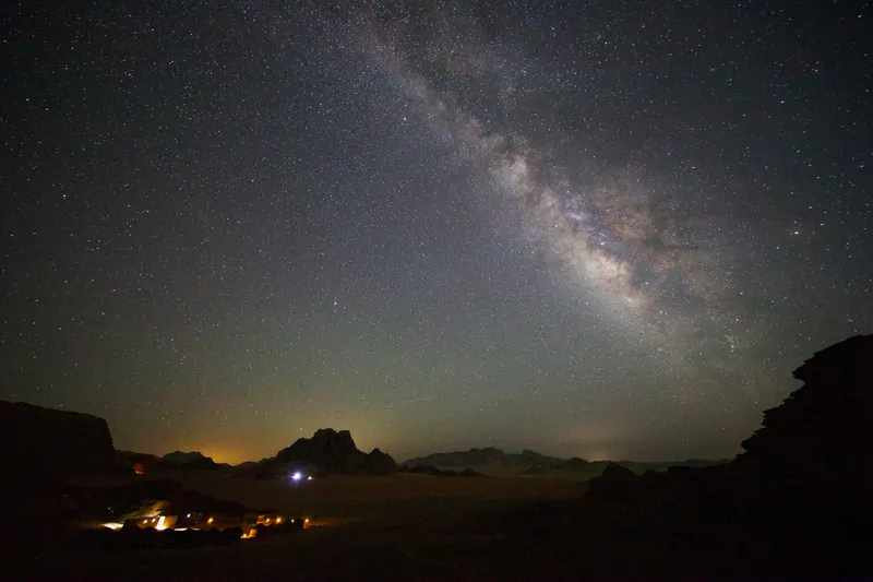 The Milky Way above the rocks of Wadi Rum at night